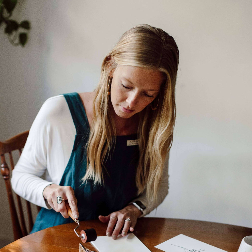 Handmade cross-back apron with deep pockets, durable fabric, and a comfortable fit for kitchen, gardening, or crafting