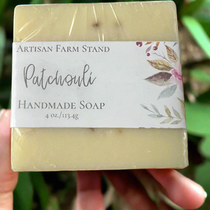 Patchouli Bar Soap wrapped with a floral label, handcrafted with natural ingredients.