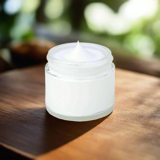 2oz jar of Vanilla Whipped Tallow Cream with creamy texture.