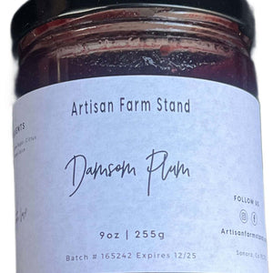 Artisan Farm Stand Damson Plum Jam jar with label showing 9oz size and batch information.
