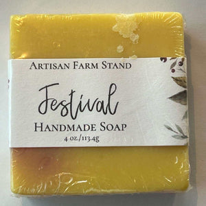 Artisan Farmstand's Festival Bar Soap wrapped in packaging.